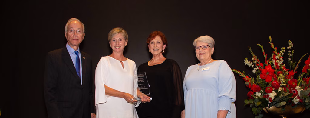 Dr. Tina N. Jones (second from left) receives the Tourism Partnership of the Year Award presented from the Alabama Governor's Conference on Tourism.