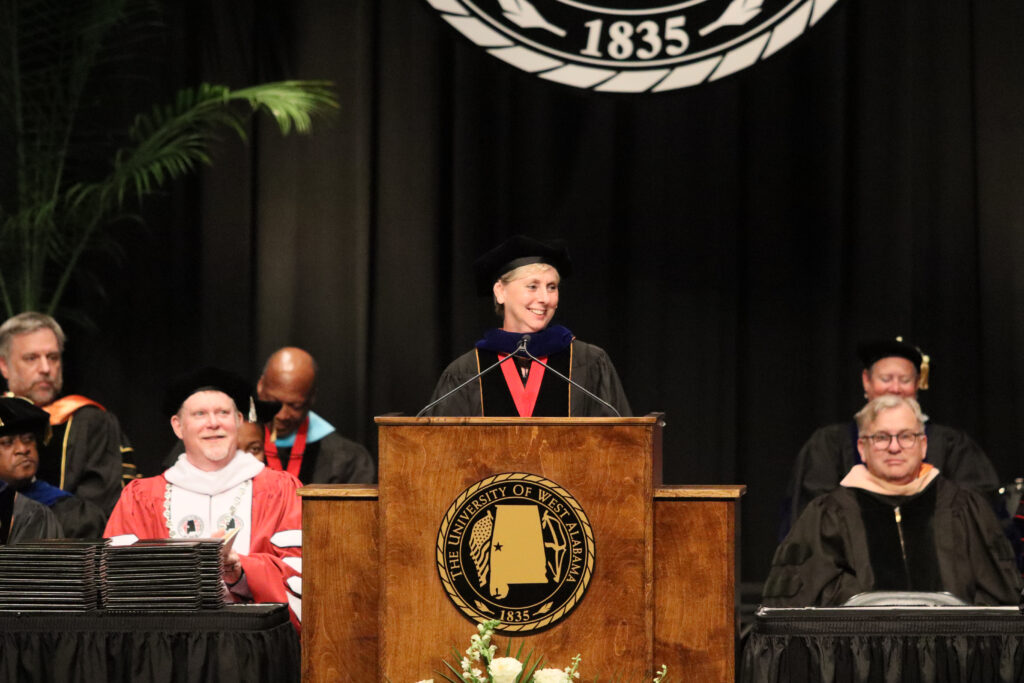 UWA Provost Dr. Tina Jones announces the Ralph M. Lyon Award at Spring 2025 Commencement Exercises.